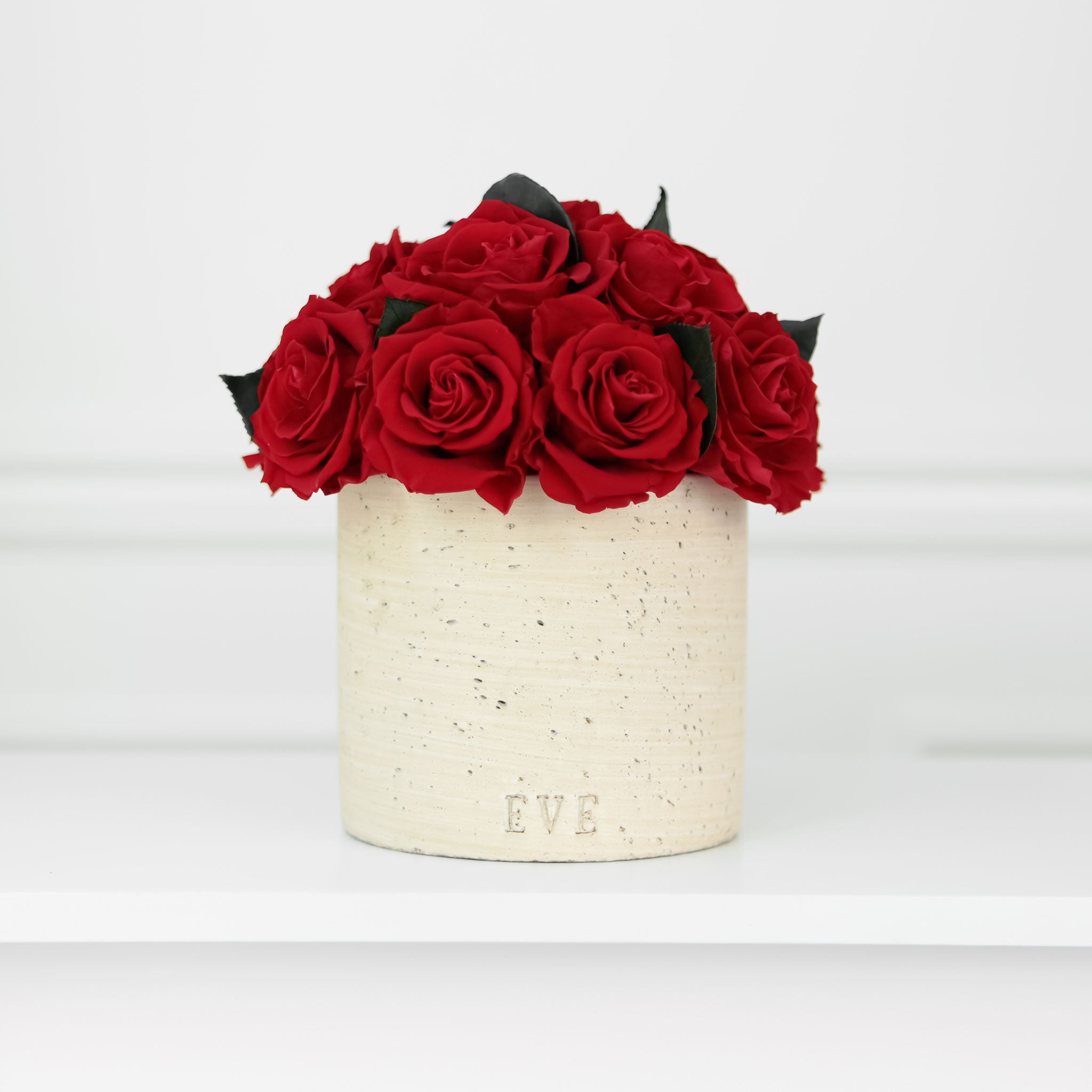 Beige Concrete Vase with Red Roses